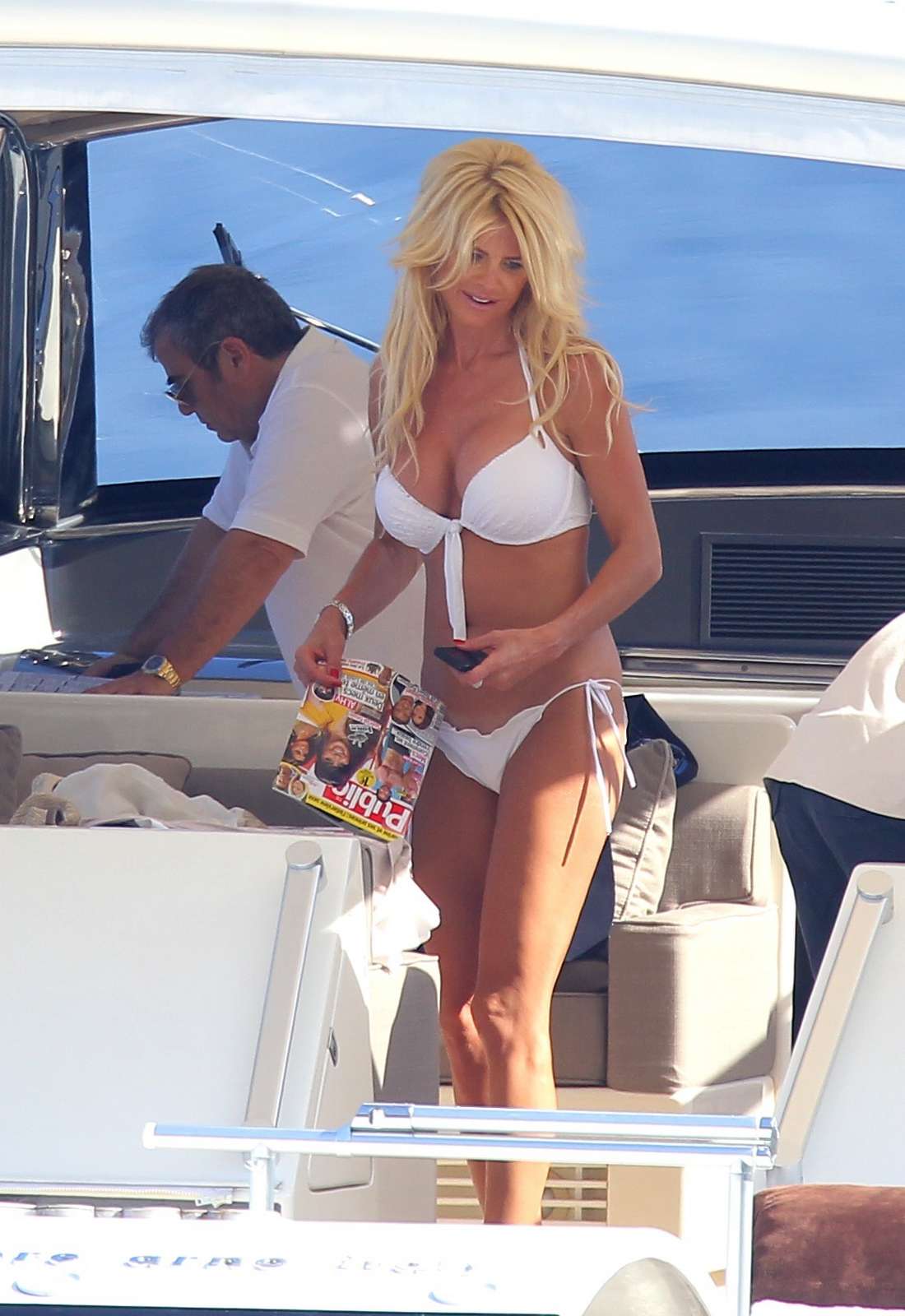 Victoria Silvstedt in a white bikini on a yacht in Monaco